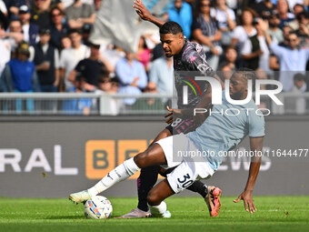 Tino Anjorin of Empoli F.C. and Nuno Tavares of S.S. Lazio are in action during the 7th day of the Serie A Championship between S.S. Lazio a...