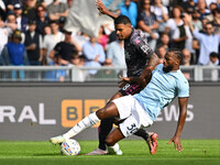 Tino Anjorin of Empoli F.C. and Nuno Tavares of S.S. Lazio are in action during the 7th day of the Serie A Championship between S.S. Lazio a...