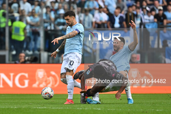 Mattia Zaccagni of S.S. Lazio, Emmanuel Ekong of Empoli F.C., and Mario Gila of S.S. Lazio are in action during the 7th day of the Serie A C...