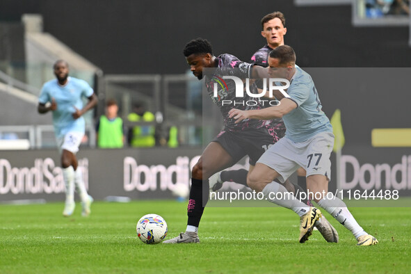 Emmanuel Ekong of Empoli F.C. and Adam Marusic of S.S. Lazio are in action during the 7th day of the Serie A Championship between S.S. Lazio...