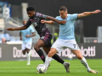 Emmanuel Ekong of Empoli F.C. and Adam Marusic of S.S. Lazio are in action during the 7th day of the Serie A Championship between S.S. Lazio...