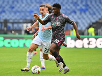 Emmanuel Ekong of Empoli F.C. and Adam Marusic of S.S. Lazio are in action during the 7th day of the Serie A Championship between S.S. Lazio...