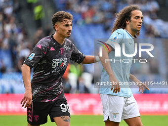 Sebastiano Esposito of Empoli F.C. and Matteo Guendouzi of S.S. Lazio participate in the 7th day of the Serie A Championship between S.S. La...