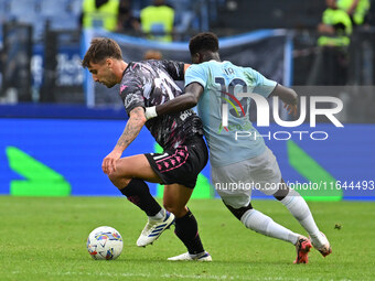 Mattia Viti of Empoli F.C. and Boulaye Dia of S.S. Lazio are in action during the 7th day of the Serie A Championship between S.S. Lazio and...