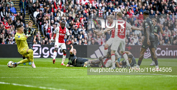 FC Groningen goalkeeper Etienne Vaessen, FC Groningen defender Wouter Prins, FC Groningen forward Brynjolfur Andersen Willumsson, and AFC Aj...