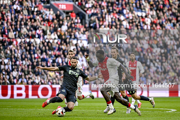 FC Groningen defender Marco Rente and AFC Ajax Amsterdam forward Brian Brobbey play during the match between Ajax and Groningen at the Johan...