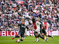 FC Groningen defender Marco Rente and AFC Ajax Amsterdam forward Brian Brobbey play during the match between Ajax and Groningen at the Johan...