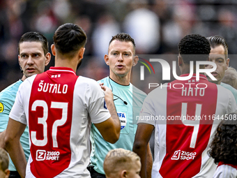 Referee Allard Lindhout officiates during the match between Ajax and Groningen at the Johan Cruijff ArenA for the Dutch Eredivisie season 20...