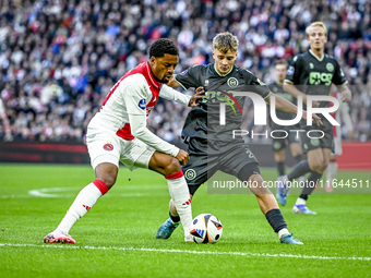 AFC Ajax Amsterdam forward Chuba Akpom and FC Groningen defender Wouter Prins play during the match between Ajax and Groningen at the Johan...