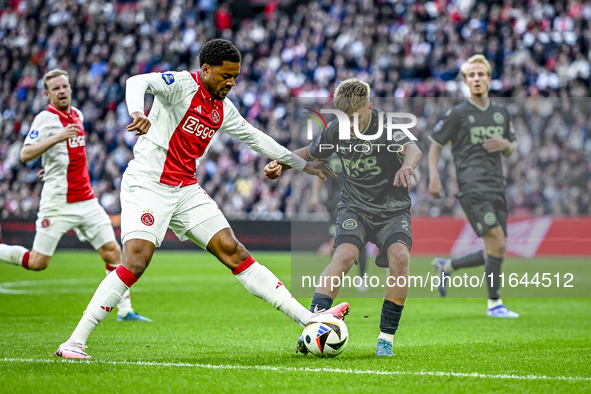 AFC Ajax Amsterdam forward Chuba Akpom and FC Groningen defender Wouter Prins play during the match between Ajax and Groningen at the Johan...