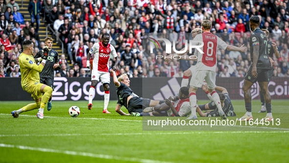 FC Groningen goalkeeper Etienne Vaessen, FC Groningen defender Wouter Prins, FC Groningen forward Brynjolfur Andersen Willumsson, and AFC Aj...