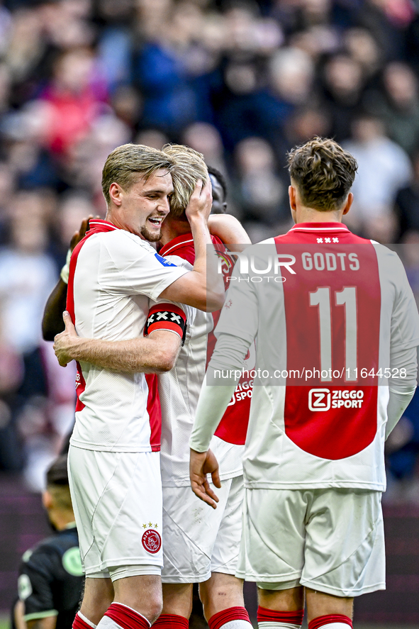 AFC Ajax Amsterdam midfielders Kenneth Taylor and Davy Klaassen celebrate the 1-0 goal during the match between Ajax and Groningen at the Jo...