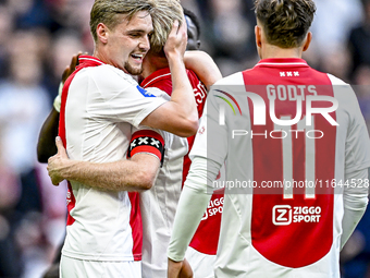 AFC Ajax Amsterdam midfielders Kenneth Taylor and Davy Klaassen celebrate the 1-0 goal during the match between Ajax and Groningen at the Jo...