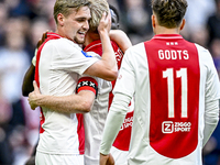 AFC Ajax Amsterdam midfielders Kenneth Taylor and Davy Klaassen celebrate the 1-0 goal during the match between Ajax and Groningen at the Jo...