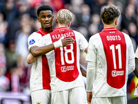 AFC Ajax Amsterdam defender Jorrel Hato and AFC Ajax Amsterdam midfielder Davy Klaassen participate in the match between Ajax and Groningen...