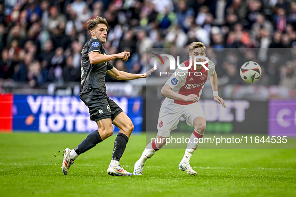 AFC Ajax Amsterdam midfielder Kenneth Taylor plays during the match between Ajax and Groningen at the Johan Cruijff ArenA for the Dutch Ered...