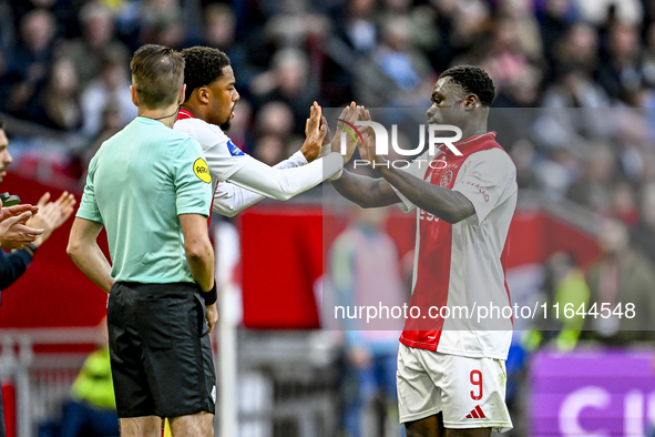 AFC Ajax Amsterdam forwards Chuba Akpom and Brian Brobbey play during the match between Ajax and Groningen at the Johan Cruijff ArenA for th...