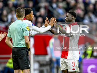 AFC Ajax Amsterdam forwards Chuba Akpom and Brian Brobbey play during the match between Ajax and Groningen at the Johan Cruijff ArenA for th...