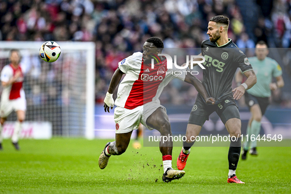 AFC Ajax Amsterdam forward Brian Brobbey and FC Groningen defender Marco Rente play during the match between Ajax and Groningen at the Johan...