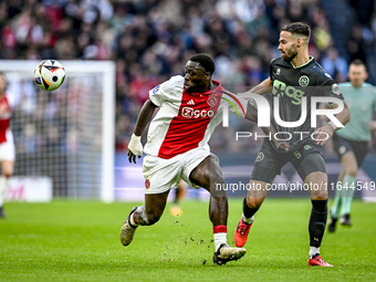 AFC Ajax Amsterdam forward Brian Brobbey and FC Groningen defender Marco Rente play during the match between Ajax and Groningen at the Johan...