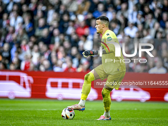 AFC Ajax Amsterdam goalkeeper plays during the match between Ajax and Groningen at the Johan Cruijff ArenA for the Dutch Eredivisie season 2...