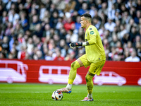 AFC Ajax Amsterdam goalkeeper plays during the match between Ajax and Groningen at the Johan Cruijff ArenA for the Dutch Eredivisie season 2...