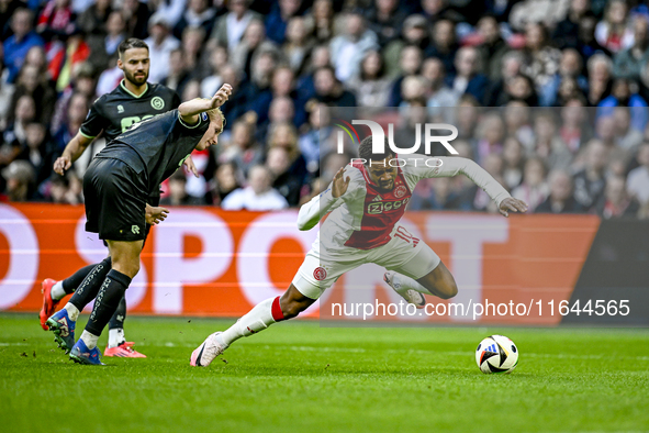 FC Groningen defender Thijmen Blokzijl and AFC Ajax Amsterdam forward Chuba Akpom play during the match between Ajax and Groningen at the Jo...