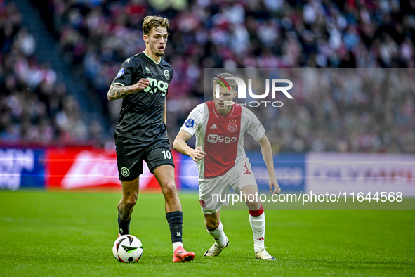 FC Groningen midfielder Luciano Valente and AFC Ajax Amsterdam defender Anton Gaaei participate in the match between Ajax and Groningen at t...