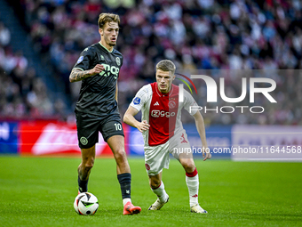 FC Groningen midfielder Luciano Valente and AFC Ajax Amsterdam defender Anton Gaaei participate in the match between Ajax and Groningen at t...