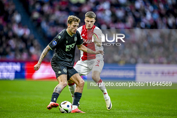 FC Groningen midfielder Luciano Valente and AFC Ajax Amsterdam defender Anton Gaaei participate in the match between Ajax and Groningen at t...