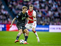 FC Groningen midfielder Luciano Valente and AFC Ajax Amsterdam defender Anton Gaaei participate in the match between Ajax and Groningen at t...