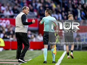 FC Groningen trainer Dick Lukkien is present during the match between Ajax and Groningen at the Johan Cruijff ArenA for the Dutch Eredivisie...