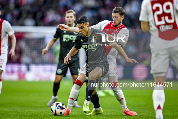 FC Groningen forward Noam Fritz Emeran and AFC Ajax Amsterdam forward Wout Weghorst play during the match between Ajax and Groningen at the...