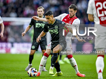 FC Groningen forward Noam Fritz Emeran and AFC Ajax Amsterdam forward Wout Weghorst play during the match between Ajax and Groningen at the...