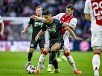 FC Groningen forward Noam Fritz Emeran and AFC Ajax Amsterdam forward Wout Weghorst play during the match between Ajax and Groningen at the...