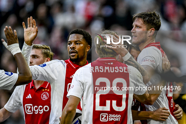 AFC Ajax Amsterdam forwards Chuba Akpom and Wout Weghorst celebrate a goal during the match between Ajax and Groningen at the Johan Cruijff...