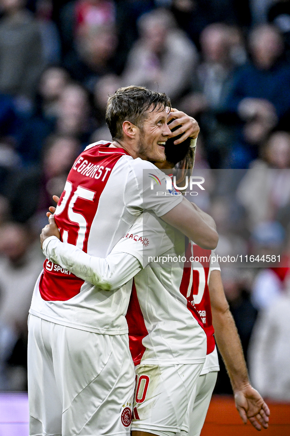 AFC Ajax Amsterdam forwards Wout Weghorst and Chuba Akpom play during the match between Ajax and Groningen at the Johan Cruijff ArenA for th...