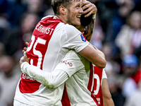 AFC Ajax Amsterdam forwards Wout Weghorst and Chuba Akpom play during the match between Ajax and Groningen at the Johan Cruijff ArenA for th...