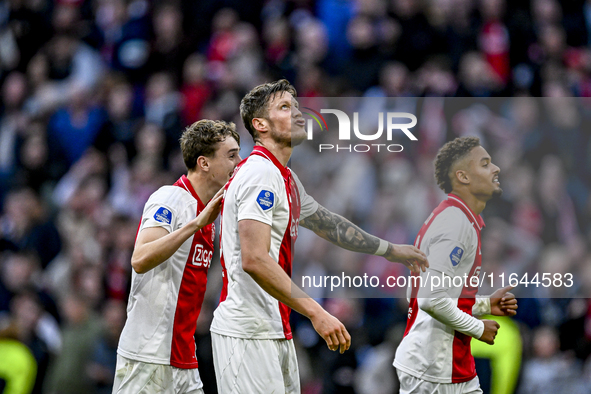 AFC Ajax Amsterdam defender Youri Baas, AFC Ajax Amsterdam forward Wout Weghorst, and AFC Ajax Amsterdam defender Devyne Rensch participate...