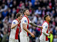 AFC Ajax Amsterdam defender Youri Baas, AFC Ajax Amsterdam forward Wout Weghorst, and AFC Ajax Amsterdam defender Devyne Rensch participate...