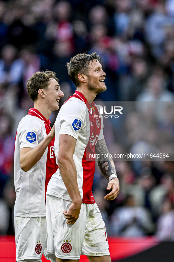 AFC Ajax Amsterdam defender Youri Baas and AFC Ajax Amsterdam forward Wout Weghorst participate in the match between Ajax and Groningen at t...