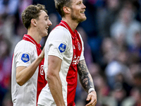 AFC Ajax Amsterdam defender Youri Baas and AFC Ajax Amsterdam forward Wout Weghorst participate in the match between Ajax and Groningen at t...