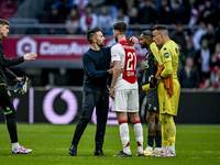 AFC Ajax Amsterdam trainer Francesco Fariolo, AFC Ajax Amsterdam midfielder Branco van den Boomen, and FC Groningen goalkeeper Etienne Vaess...