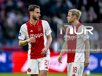 AFC Ajax Amsterdam midfielder Branco van den Boomen and AFC Ajax Amsterdam midfielder Davy Klaassen play during the match between Ajax and G...