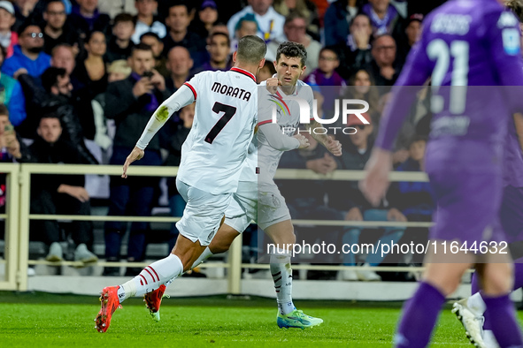 Christian Pulisic of AC Milan celebrates after scoring first goal during the Serie A Enilive match between ACF Fiorentina and AC Milan at St...