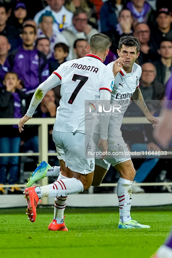 Christian Pulisic of AC Milan celebrates after scoring first goal during the Serie A Enilive match between ACF Fiorentina and AC Milan at St...