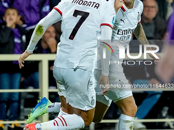 Christian Pulisic of AC Milan celebrates after scoring first goal during the Serie A Enilive match between ACF Fiorentina and AC Milan at St...