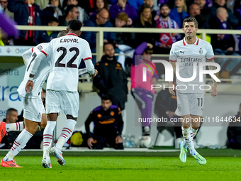 Christian Pulisic of AC Milan celebrates after scoring first goal during the Serie A Enilive match between ACF Fiorentina and AC Milan at St...