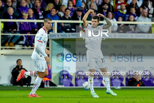 Christian Pulisic of AC Milan celebrates after scoring first goal during the Serie A Enilive match between ACF Fiorentina and AC Milan at St...