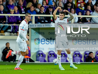 Christian Pulisic of AC Milan celebrates after scoring first goal during the Serie A Enilive match between ACF Fiorentina and AC Milan at St...